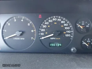 1999 Jeep Grand Cherokee Laredo with VIN 1J4GW58NXXC623753, listed as a IAAI auction lot 41685540 with 190,134 mi miles. Bid and sale history available at carsss.com. Image 7.