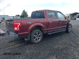 2015 Ford F-150 XLT with VIN 1FTEW1EF2FFA17900, listed as a IAAI auction lot 40927904 with 119,105 mi miles. Bid and sale history available at carsss.com. Image 4.