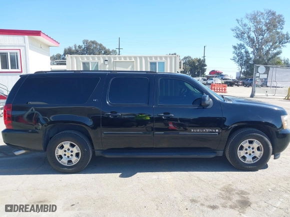 2007 Chevrolet Suburban LT with VIN 3GNFC16J07G243215, listed as a IAAI auction lot 41631673 with 200,990 mi miles. Bid and sale history available at carsss.com. Image 14.