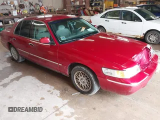2001 Mercury Grand Marquis GS z VIN 2MEFM74W01X636957, wystawiony jako IAAI lot #42270858 z przebiegiem 181 372 mil mil oraz . Historia ofert i sprzedaży dostępna na DreamBid. Obrazek 1.