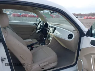 2014 Volkswagen Beetle 2.5L w/Sun with VIN 3VWJP7AT8EM611560, listed as a IAAI auction lot 41488488 with 140,798 mi miles and . Bid and sale history available at DreamBid. Image 5.