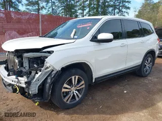 2017 Honda Pilot EX-L with VIN 5FNYF5H58HB044131, listed as a IAAI auction lot 41843395 with 122,311 mi miles. Bid and sale history available at carsss.com. Image 2.