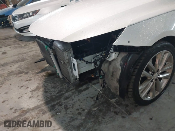 2015 Kia Optima SXL Turbo with VIN 5XXGR4A63FG408045, listed as a IAAI auction lot 41475991 with 133,263 mi miles and . Bid and sale history available at DreamBid. Image 6.