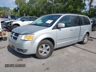 2010 Dodge Grand Caravan SXT with VIN 2D4RN5D15AR196651, listed as a IAAI auction lot 42105957 with 244,374 mi miles and . Bid and sale history available at DreamBid. Image 2.