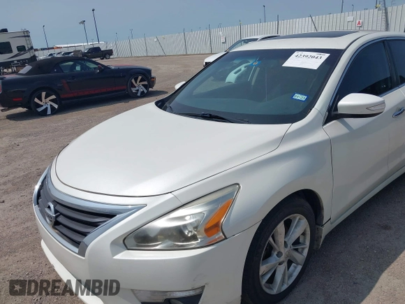 2015 Nissan Altima 2.5 z VIN 1N4AL3AP1FC594152, wystawiony jako IAAI lot #42392043 z przebiegiem 205 410 mil mil oraz . Historia ofert i sprzedaży dostępna na DreamBid. Obrazek 6.