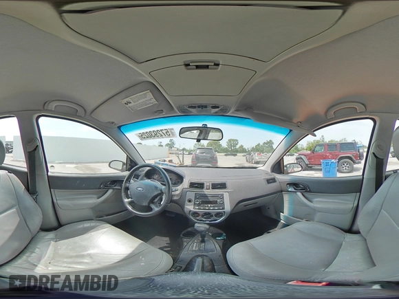 2007 Ford Focus S z VIN 1FAHP37N47W245222, wystawiony jako Copart lot #57293025 z przebiegiem 102 552 mil mil oraz Szkoda całkowita • Salvage title. Historia ofert i sprzedaży dostępna na DreamBid. Obrazek 14.