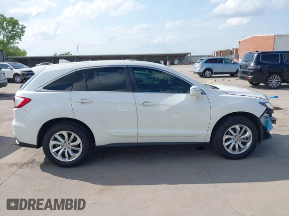 2018 Acura RDX with VIN 5J8TB3H39JL010714, listed as a IAAI auction lot 42128591 with 113,499 mi miles and . Bid and sale history available at DreamBid. Image 14.