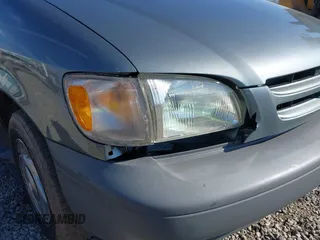 2000 Toyota Sienna CE with VIN 4T3ZF19C8YU272134, listed as a IAAI auction lot 41505762 with 234,706 mi miles. Bid and sale history available at carsss.com. Image 15.