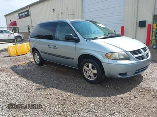2006 Dodge Caravan SXT with VIN 1D4GP45R56B592939, listed as a IAAI auction lot 42611878 with 246,055 mi miles and . Bid and sale history available at DreamBid. Image 1.