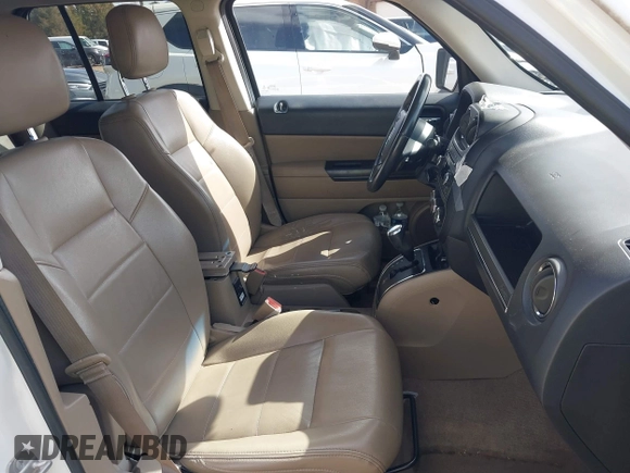 2014 Jeep Patriot High Altitude with VIN 1C4NJPFA6ED663066, listed as a IAAI auction lot 41709104 with 115,988 mi miles and . Bid and sale history available at carsss.com. Image 5.