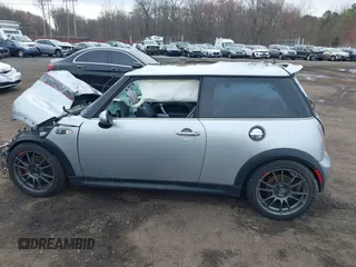 2006 MINI Hardtop S with VIN WMWRE33546TL23876, listed as a IAAI auction lot 41858060 with 146,359 mi miles and . Bid and sale history available at DreamBid. Image 14.