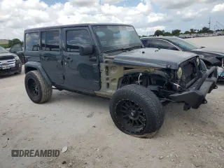 2016 Jeep Wrangler Unlimited Sahara with VIN 1C4HJWEG8GL275844, listed as a Copart auction lot 58997665 with 71,583 mi miles and Salvage title. Bid and sale history available at DreamBid. Image 4.