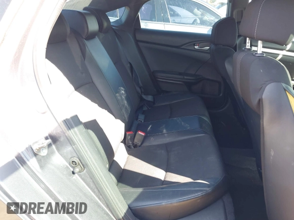 2019 Honda Civic Sport with VIN 19XFC2F82KE019704, listed as a IAAI auction lot 41770051 with 90,011 mi miles and . Bid and sale history available at DreamBid. Image 8.