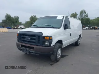2012 Ford Econoline Cargo Commercial with VIN 1FTNE1EW6CDA42261, listed as a IAAI auction lot 41750879 with 249,408 mi miles and . Bid and sale history available at carsss.com. Image 2.