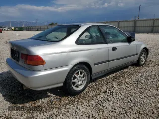 1998 Honda Civic HX with VIN 1HGEJ7123WL114255, listed as a Copart auction lot 66585544 with 251,047 mi miles and Clean Title. Bid and sale history available at carsss.com. Image 3.