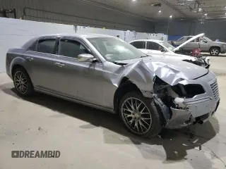 2014 Chrysler 300 C with VIN 2C3CCAKTXEH383941, listed as a Copart auction lot 41703475 with 105,709 mi miles and Salvage Title. Bid and sale history available at DreamBid. Image 4.
