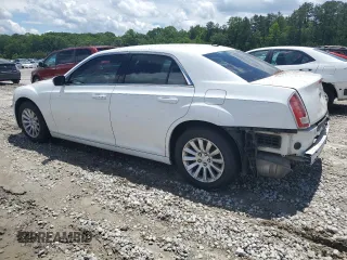 2014 Chrysler 300 z VIN 2C3CCAAG9EH239902, wystawiony jako Copart lot #56529875 z przebiegiem 118 752 mil mil oraz Szkody całkowita. Historia ofert i sprzedaży dostępna na DreamBid. Obrazek 2.