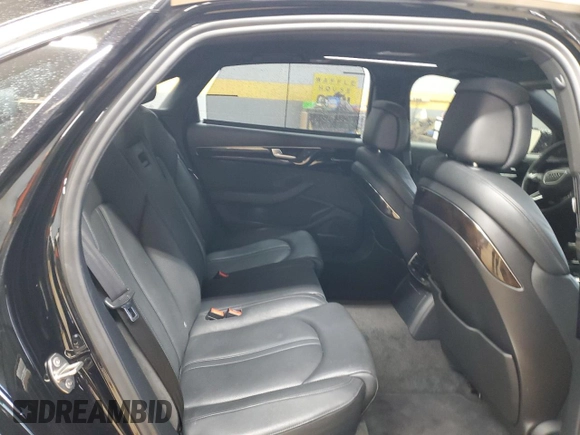 2016 Audi A8 3.0T z VIN WAU34AFD4GN009134, wystawiony jako Copart lot #89312175 z przebiegiem 164 842 mil mil oraz Czysty tytuł • Clean title. Historia ofert i sprzedaży dostępna na DreamBid. Obrazek 10.