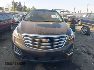 2019 Cadillac XT5 Luxury FWD z VIN 1GYKNCRS2KZ251207, wystawiony jako IAAI lot #42066271 z przebiegiem 128 226 mil mil oraz . Historia ofert i sprzedaży dostępna na DreamBid. Obrazek 12.