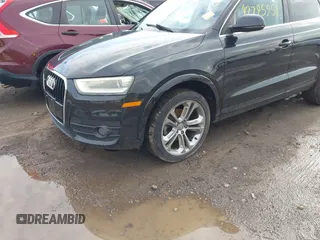 2015 Audi Q3 Premium Plus z VIN WA1EFCFS6FR001473, wystawiony jako IAAI lot #42795951 z przebiegiem 148 638 mil mil oraz . Historia ofert i sprzedaży dostępna na DreamBid. Obrazek 6.