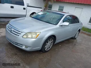 2005 Toyota Avalon XL with VIN 4T1BK36B25U061021, listed as a IAAI auction lot 41726203 with 227,845 mi miles. Bid and sale history available at carsss.com. Image 2.
