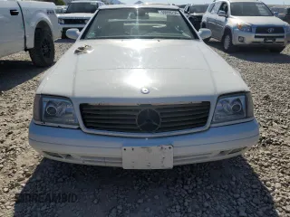 1999 Mercedes-Benz SL 500 z VIN WDBFA68FXXF184257, wystawiony jako Copart lot #59099755 z przebiegiem 166 349 mil mil oraz Czysty tytuł • Clean title. Historia ofert i sprzedaży dostępna na DreamBid. Obrazek 5.