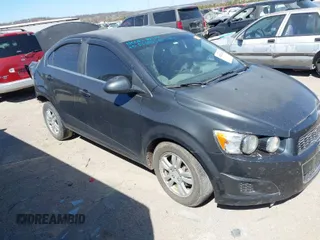 2015 Chevrolet Sonic LT with VIN 1G1JC5SB0F4213841, listed as a IAAI auction lot 41822444 with 70,257 mi miles and . Bid and sale history available at DreamBid. Image 1.