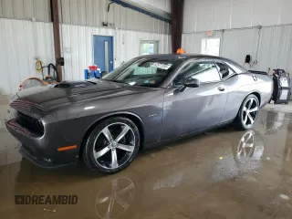 2015 Dodge Challenger R/T with VIN 2C3CDZAT0FH846636, listed as a Copart auction lot 62577255 with 74,354 mi miles and Salvage title. Bid and sale history available at DreamBid. Image 1.