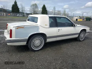 1991 Cadillac Eldorado z VIN 1G6EL13B9MU604115, wystawiony jako Copart lot #52232425 z przebiegiem 95 570 mil mil oraz Szkody całkowita. Historia ofert i sprzedaży dostępna na DreamBid. Obrazek 3.