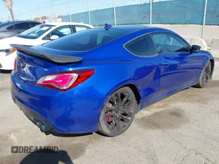 2013 Hyundai Genesis Coupe Grand Touring with VIN KMHHU6KJ5DU092555, listed as a IAAI auction lot 41959840 with 52,016 mi miles and . Bid and sale history available at DreamBid. Image 4.