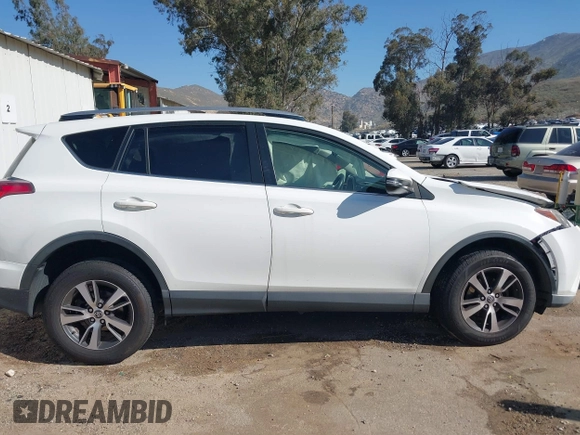2017 Toyota RAV4 XLE with VIN JTMWFREV9HJ128521, listed as a IAAI auction lot 41658054 with 106,788 mi miles and . Bid and sale history available at DreamBid. Image 13.