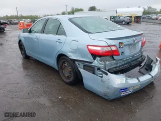 2007 Toyota Camry CE with VIN 4T1BE46K57U714232, listed as a IAAI auction lot 41963018 with 143,777 mi miles. Bid and sale history available at carsss.com. Image 3.