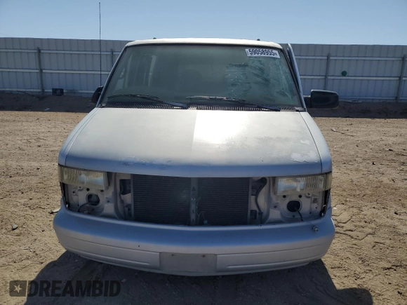 1996 GMC Safari z VIN 1GKDM19W4TB522520, wystawiony jako Copart lot #59058955 z przebiegiem Nie podano mil oraz Tytuł czysty. Historia ofert i sprzedaży dostępna na DreamBid. Obrazek 5.