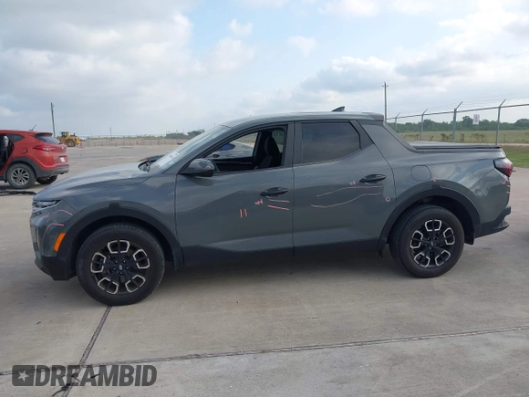 2022 Hyundai Santa Cruz SEL with VIN 5NTJBDAE4NH022823, listed as a IAAI auction lot 42051616 with 23,158 mi miles and . Bid and sale history available at DreamBid. Image 14.