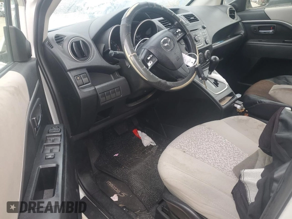 2012 Mazda 5 Sport with VIN JM1CW2BL4C0141205, listed as a Copart auction lot 71437504 with 135,271 mi miles and Salvage Title. Bid and sale history available at DreamBid. Image 8.