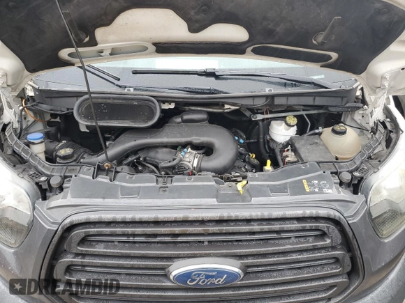 2017 Ford Transit z VIN 1FTYR2XM0HKA03493, wystawiony jako Copart lot #70397104 z przebiegiem 133 839 mil mil oraz Szkoda całkowita • Salvage title. Historia ofert i sprzedaży dostępna na DreamBid. Obrazek 13.