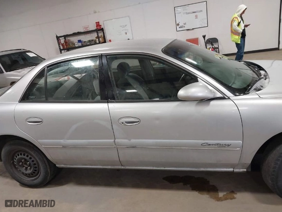 2001 Buick Century Custom with VIN 2G4WS52JX11255232, listed as a IAAI auction lot 41380556 with 1 miles. Bid and sale history available at carsss.com. Image 13.