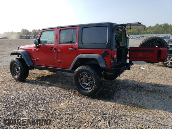 2013 Jeep Wrangler Unlimited Rubicon 10th Anniversary z VIN 1C4HJWFG2DL572943, wystawiony jako Copart lot #80610363 z przebiegiem 88 296 mil mil oraz Szkoda całkowita • Salvage title. Historia ofert i sprzedaży dostępna na DreamBid. Obrazek 2.