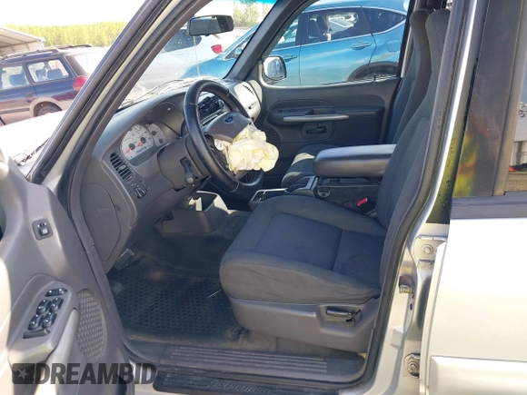 2002 Ford Explorer Sport Trac Value с VIN 1FMZU77EX2UC29735, выставлен на аукционе IAAI как лот 42029669 с пробегом 87 304 миль миль и . История ставок и продаж доступна на DreamBid. Изображение 5.