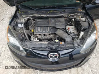 2014 Mazda 2 Touring z VIN JM1DE1LY9E0175946, wystawiony jako Copart lot #55459255 z przebiegiem 109 494 mil mil oraz Szkoda całkowita • Salvage title. Historia ofert i sprzedaży dostępna na DreamBid. Obrazek 12.