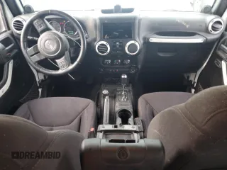 2013 Jeep Wrangler Unlimited Sport z VIN 1C4BJWDG0DL574795, wystawiony jako Copart lot #59230515 z przebiegiem 132 808 mil mil oraz Szkoda całkowita • Salvage title. Historia ofert i sprzedaży dostępna na DreamBid. Obrazek 8.
