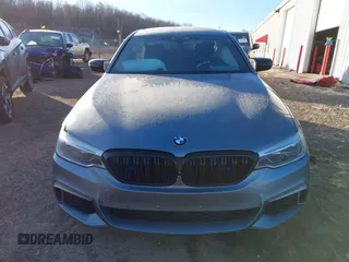 2019 BMW 5 Series M550i xDrive with VIN WBAJB9C51KB464283, listed as a IAAI auction lot 41397420 with Not provided miles and . Bid and sale history available at DreamBid. Image 12.