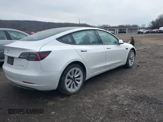 2023 Tesla Model 3 Long Range with VIN 5YJ3E1EB8PF600291, listed as a IAAI auction lot 41651156 with 37,055 mi miles and . Bid and sale history available at DreamBid. Image 4.