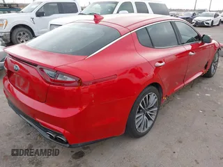 2019 Kia Stinger with VIN KNAE15LA1K6056093, listed as a IAAI auction lot 41620911 with 99,295 mi miles and . Bid and sale history available at DreamBid. Image 4.