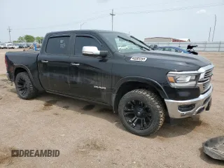 2019 Ram 1500 Laramie with VIN 1C6SRFJTXKN714855, listed as a Copart auction lot 58765625 with Not provided miles and Salvage title. Bid and sale history available at DreamBid. Image 4.
