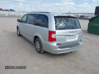 2011 Chrysler Town & Country Touring with VIN 2A4RR5DGXBR780044, listed as a IAAI auction lot 42035045 with 205,627 mi miles and . Bid and sale history available at DreamBid. Image 3.