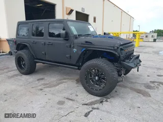 2018 Jeep Wrangler Unlimited Sport S with VIN 1C4HJXDG2JW228483, listed as a IAAI auction lot 41710364 with 56,970 mi miles. Bid and sale history available at carsss.com. Image 1.