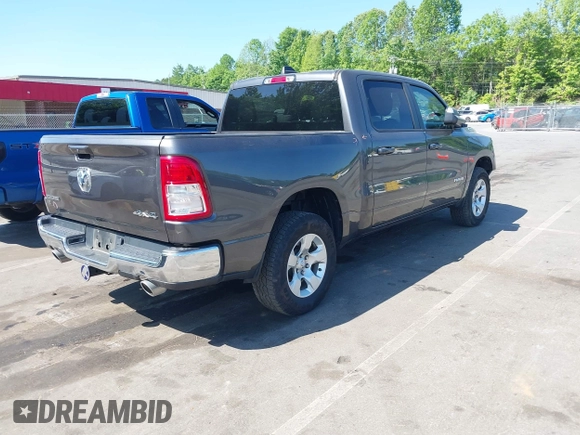 2021 Ram 1500 Big Horn with VIN 1C6SRFFT7MN620668, listed as a IAAI auction lot 42183592 with 74,829 mi miles and . Bid and sale history available at DreamBid. Image 4.
