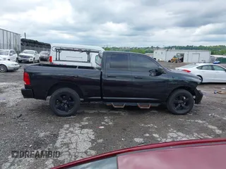 2015 Ram 1500 Express z VIN 1C6RR7FT4FS781293, wystawiony jako IAAI lot #42364921 z przebiegiem 101 451 mil mil oraz . Historia ofert i sprzedaży dostępna na DreamBid. Obrazek 13.