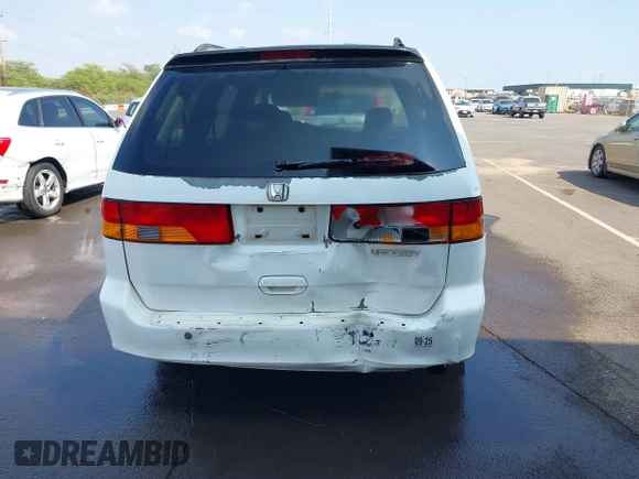 2002 Honda Odyssey EX z VIN 2HKRL18632H556791, wystawiony jako IAAI lot #41562553 z przebiegiem 222 976 mil mil oraz . Historia ofert i sprzedaży dostępna na DreamBid. Obrazek 17.